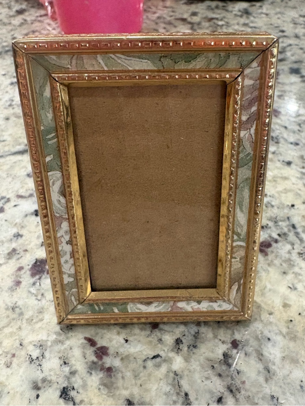 Small 2 x 3 gold with light floral trim picture frame GUC